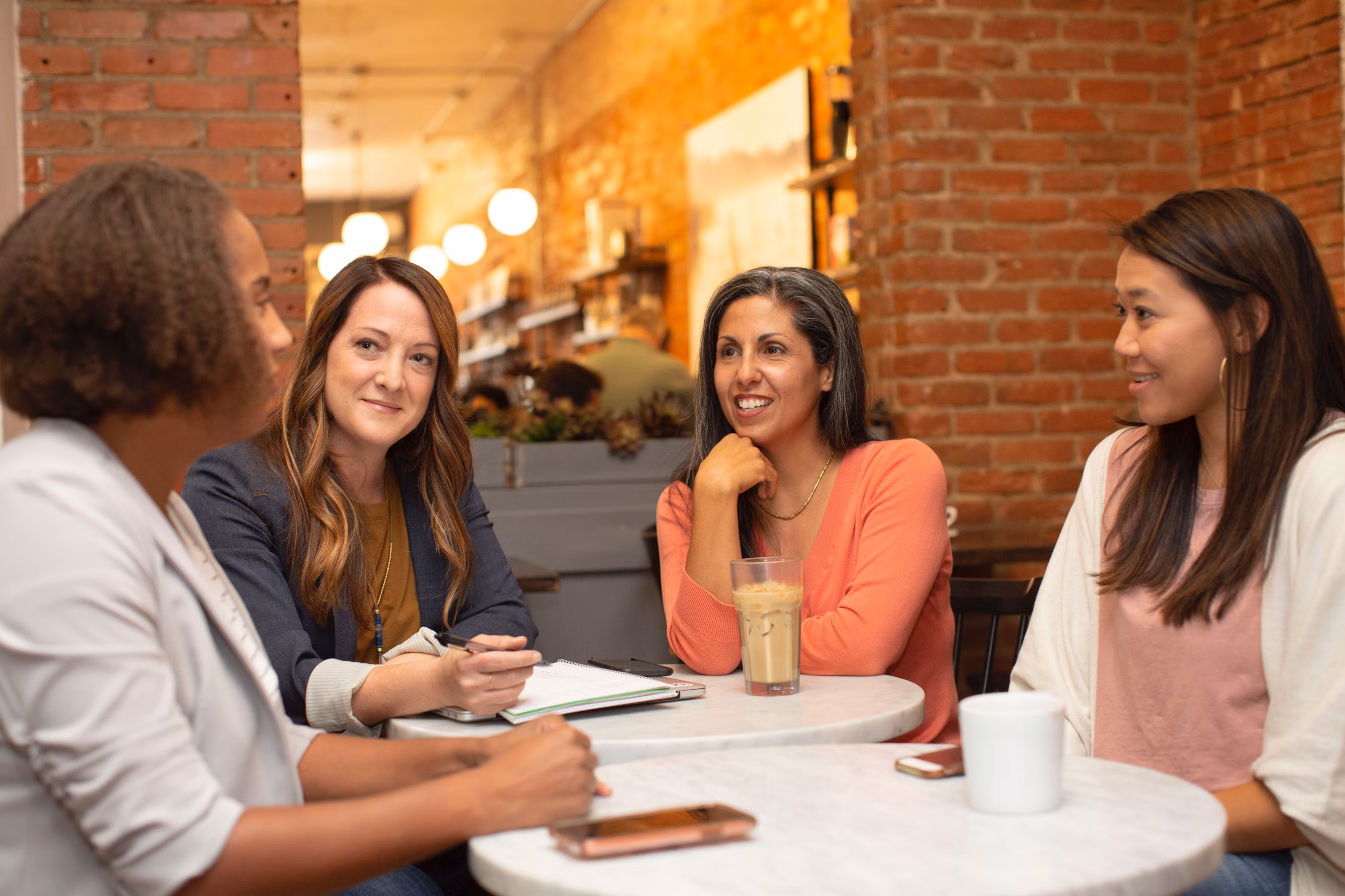 Businesswomen sitting and chatting